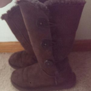 Brown tall ugg boots with buttons