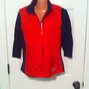 Red color blocked best with black down the sides