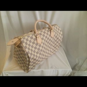 100% Authentic Louis Vuitton