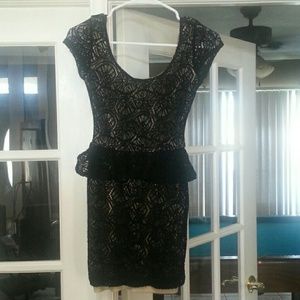 Lace lined peplum dress