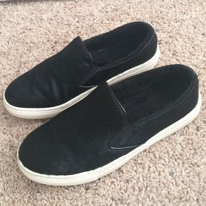 Black Pony hair slip ons