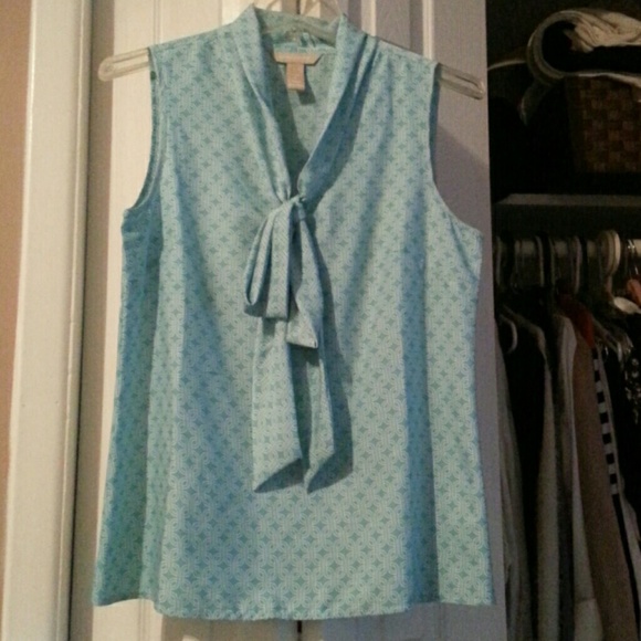 Light blue turquoise - ish color sleeveless top