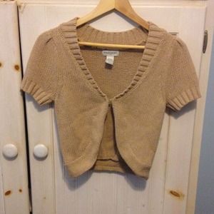 Tan cardigan/sweater...