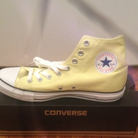 Yellow converse high top sneakers