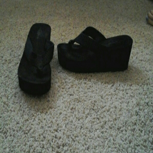 Black wedge flip flops