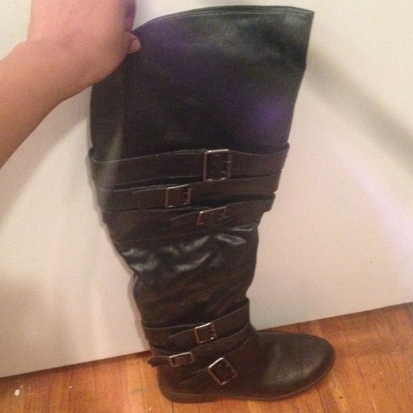 Black over the knee boots with buckles