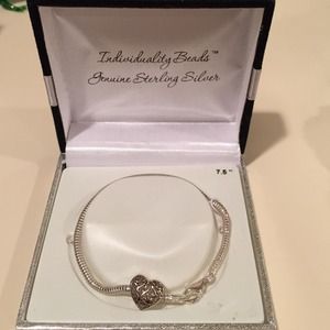 Sterling silver charm bracelet! Never worn!