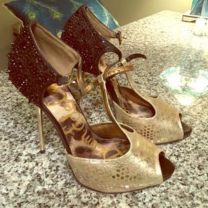 Gold heels Black spikes