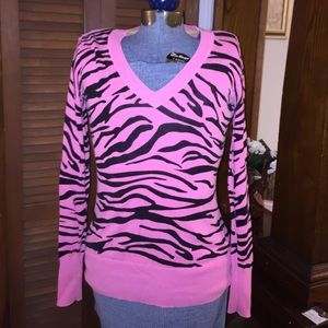 Pink zebra print Nollie sweater.