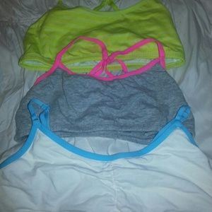 3 sports bras size M with pretty pink green blue