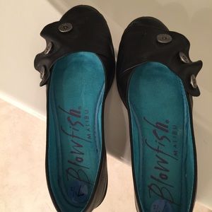 Black flats.  Leather.