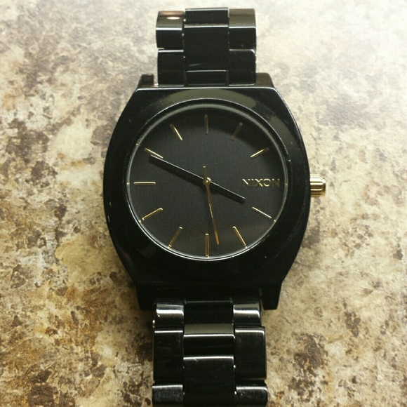 Black and gold accent Nixon women's watch