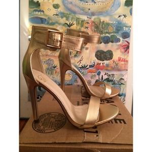 UNWORN Gold high heels