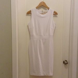 White knee length dress
