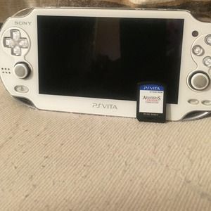 Sony PS vita with memory card and 1 Game As
