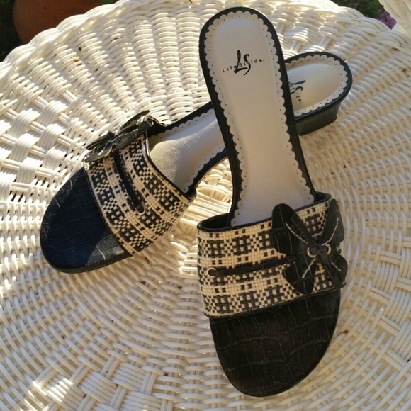 Black and white sandals  Size is 9N