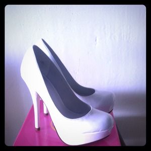Reduced price. White heels