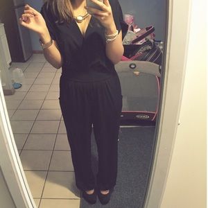 Black short sleeve V-neck jumpsuit w/ pockets