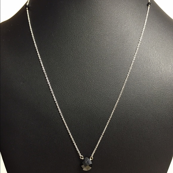 Black gemstone necklace.