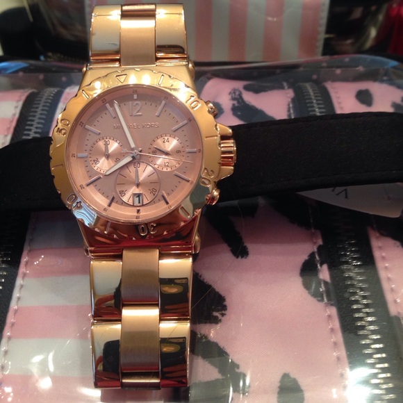 MK gold rose watch.