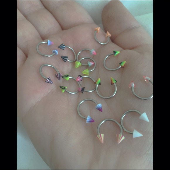 *3* multi-colored nose/ear/septum ring.