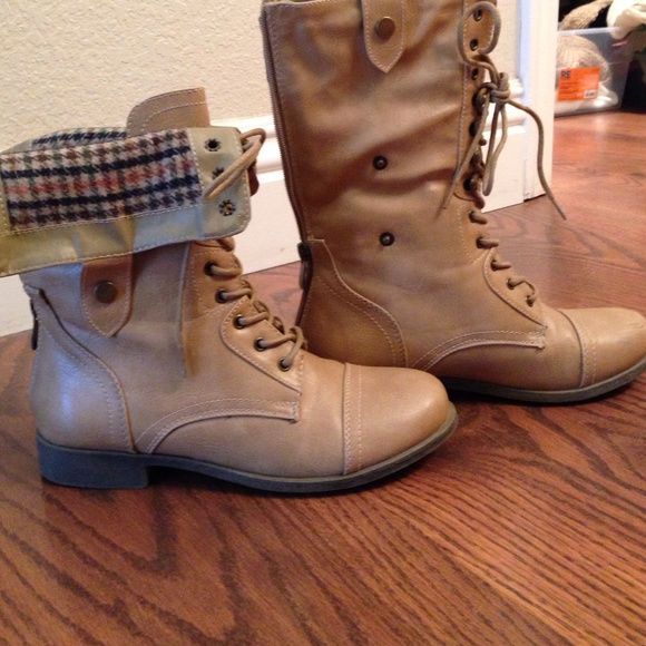 Tan combat boots.