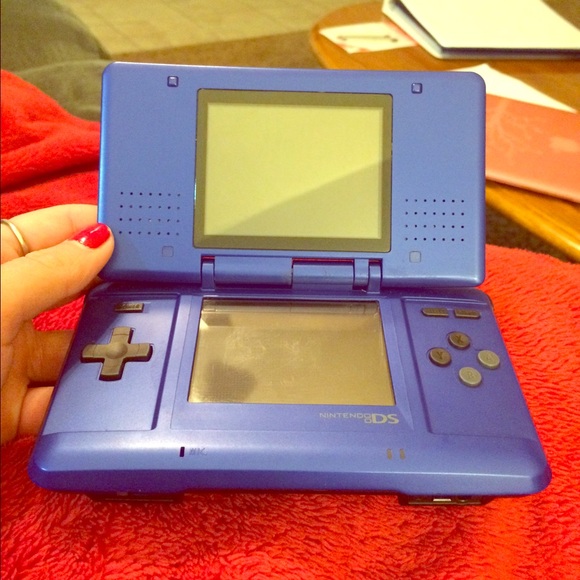 Nintendo DS with charger and stylus