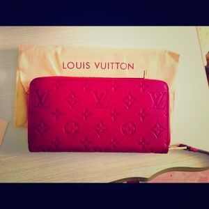 Louis Vuitton monogram leather zippy red wallet