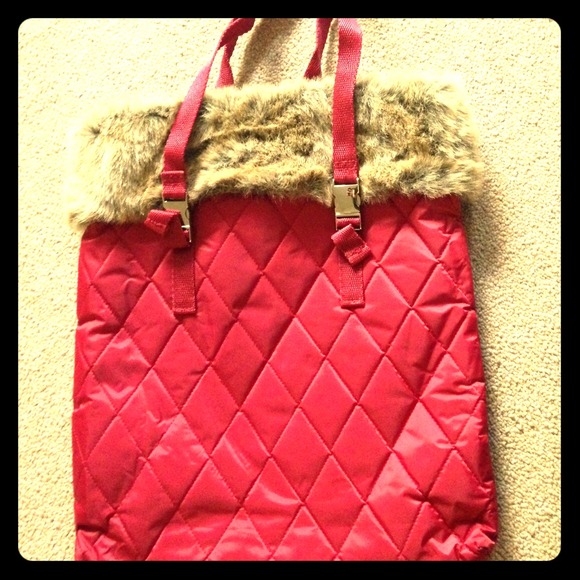 Red tote bag with faux fur on the side