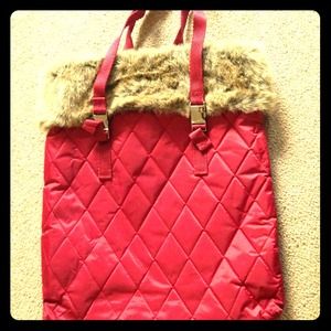 Red tote bag with faux fur on the side
