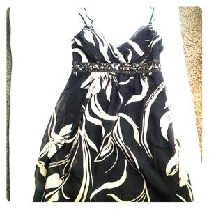 Beige and black beaded dress