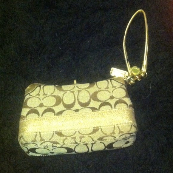 Authentic Coach wristlet.
