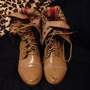 Brown boots w/ leopard print on inside.