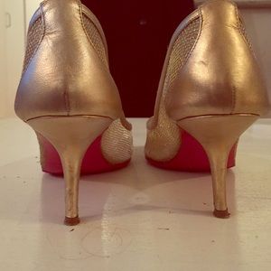 Louboutin gold peep toe pumps