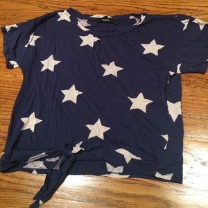 A shirt with white Stars and a blue base