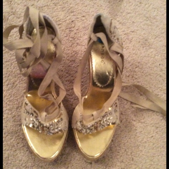 Tan Tie up Wedged Suede Espadrilles.