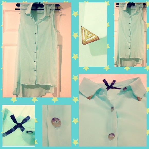 Mint sleeveless sheer button down blouse.