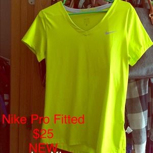 Extra Fitted Nike a Pro shirt.