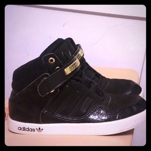 Black and gold adidas strap shoes