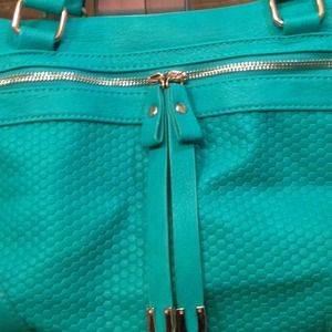 Dark mint green handbag