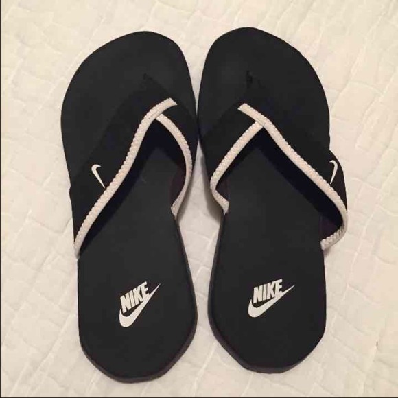Nike Flip Flops.