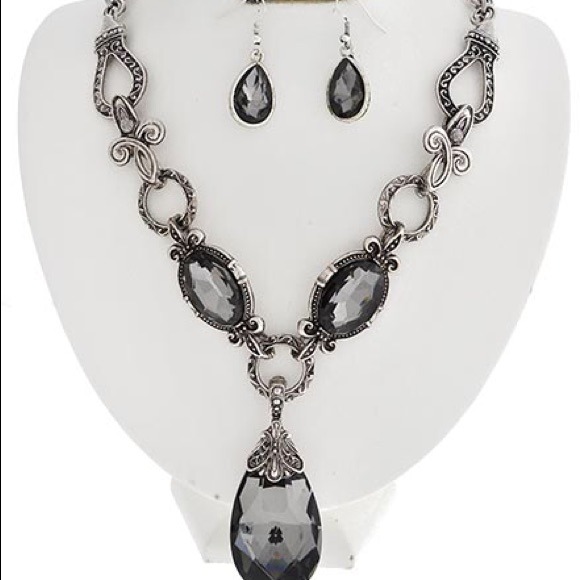 Silver tone metal black diamond glass