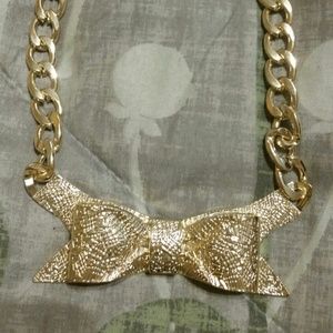 Gold bow tie necklace