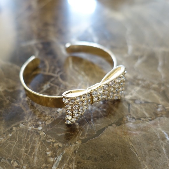 Gold bow cuff bracelet