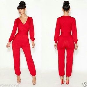Red Jumpsuit  Lg. Never worn w/o tag. Stretchy