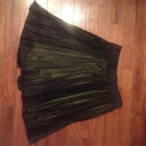 Black skirt with lime green liner.