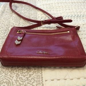 Cole Haan clutch with adjustable shoulder strap