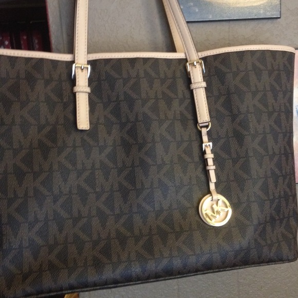A brown Mk tote ON HOLD