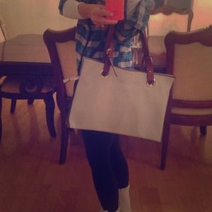 Light gray leather purse. Never been used!