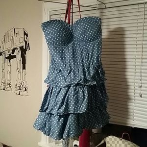 Polka dot strapless dress.